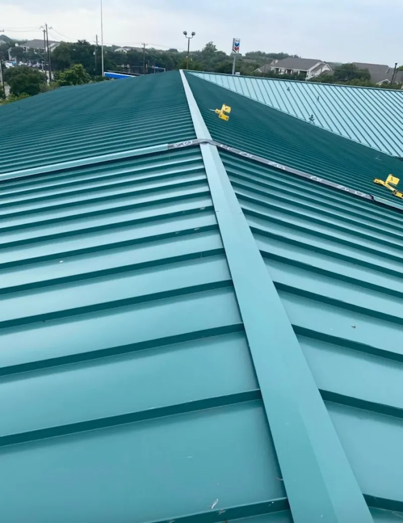 Green commercial metal roof ridge and valley for Metal Roof Repair in Oregon City
